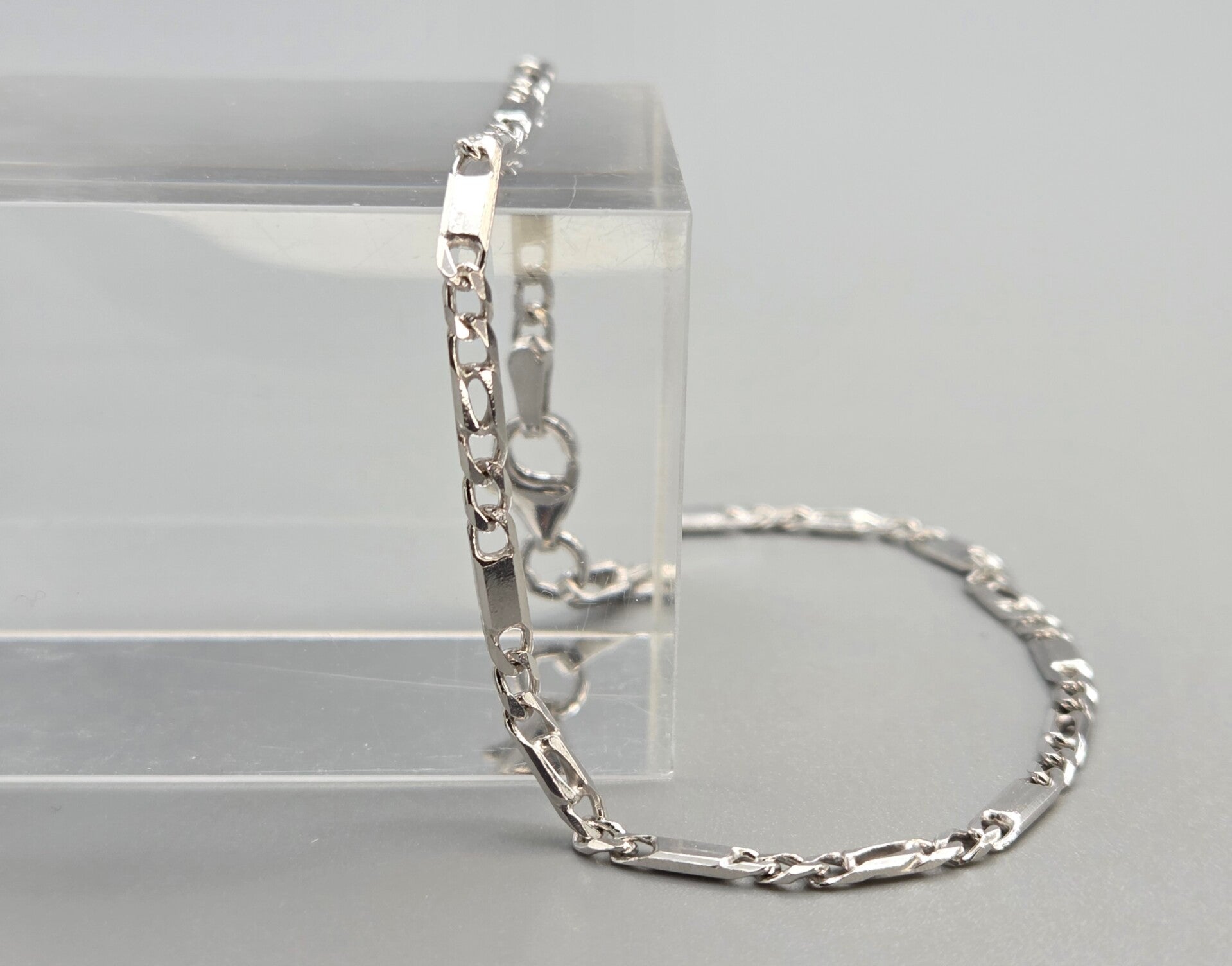 Zilveren valkenoog armband met lobsterslot. 2026/285.