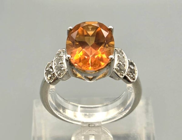 Vintage ring met edelstenen mystic topaas en witte topaas. 2026/437