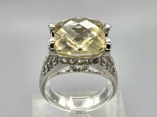 Vintage ring met edelstenen geel/groene topaas en witte topaas. 2026/439