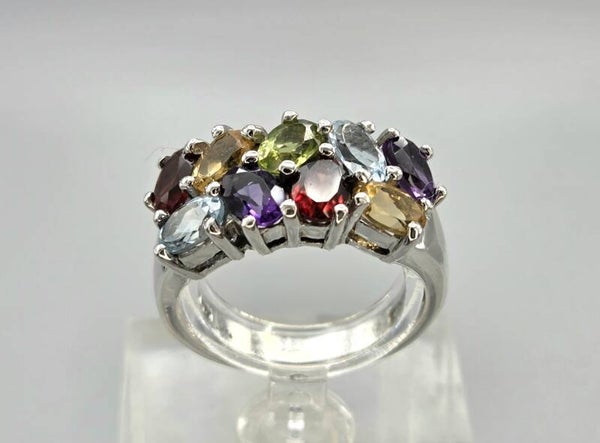 Vintage ring met edelstenen granaat, topaas, citrien en amethist. 2026/435