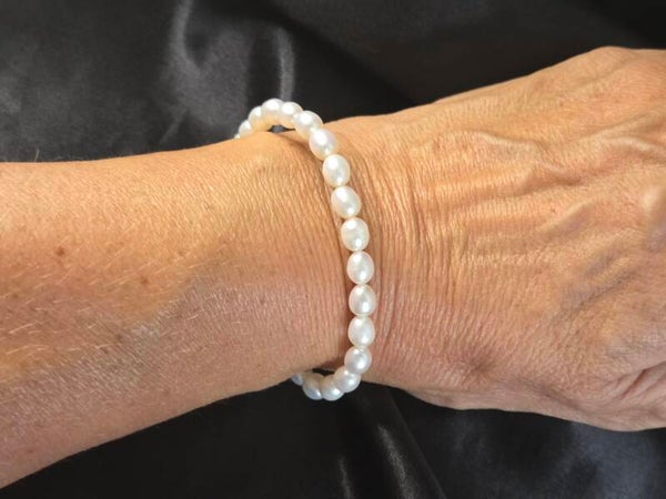 Zilveren Armband met Zoetwaterparels. 2026/477
