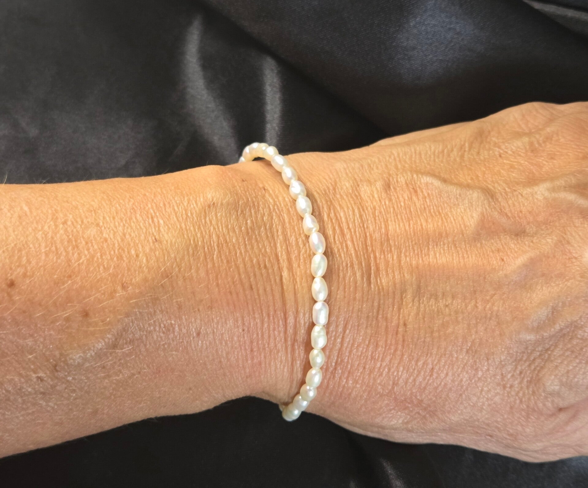 Zilveren Armband met Zoetwaterparels. 2026/481
