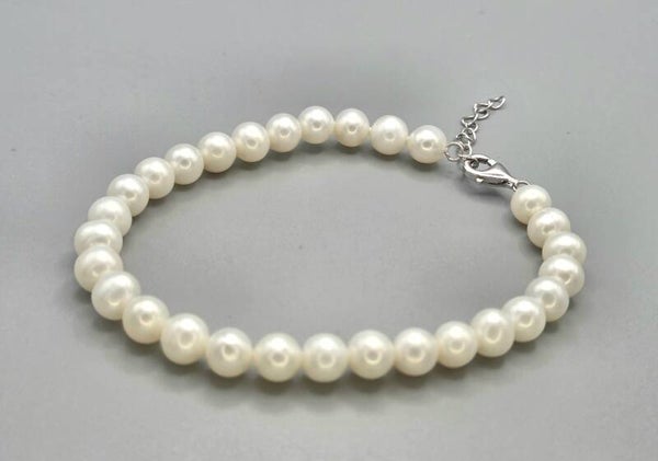 Zilveren Armband met Zoetwaterparels. 2026/471