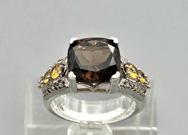 Vintage ring met edelstenen rooktopaas en gele en witte topaas. 2026/526