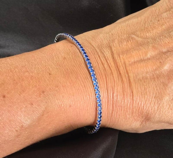 Zilveren stretch tennis bracelet met saffier zirkonia's. 2026/519