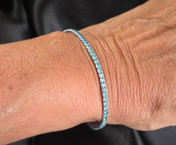 Zilveren stretch tennis bracelet met topaas zirkonia's. 2026/520