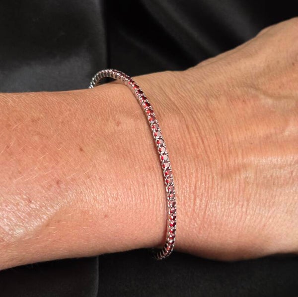 Zilveren stretch tennis bracelet met granaat zirkonia's. 2026/525