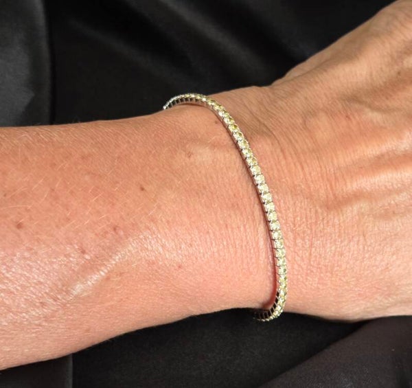 Zilveren stretch tennis bracelet met citrien zirkonia's. 2026/528