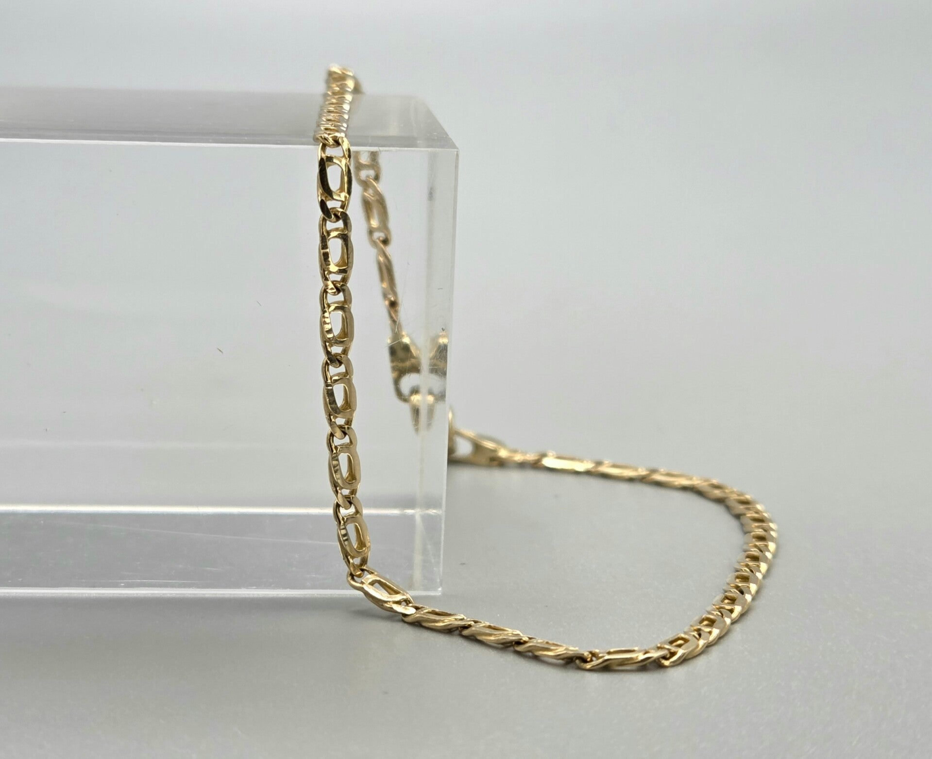 Vintage gouden valkenoog schakel armband. 2026/618