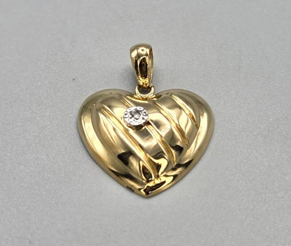 Vintage gouden bi-color hartje met diamant. 2026/583