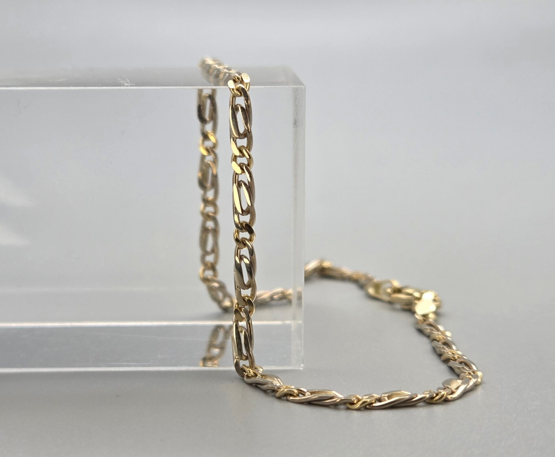 Vintage gouden bi-color gourmet/valkenoog schakel armband. 2026/598