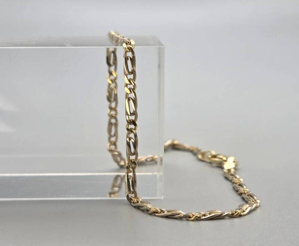 Vintage gouden bi-color gourmet/valkenoog schakel armband. 2026/598