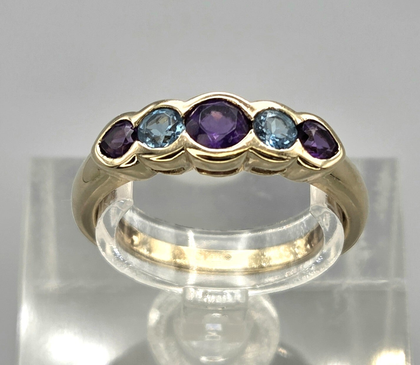 Vintage ring met edelsteen topaas en amethist.  2026/622