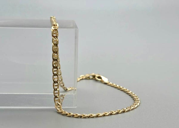 Vintage gouden valkenoog schakel armband. 2026/651