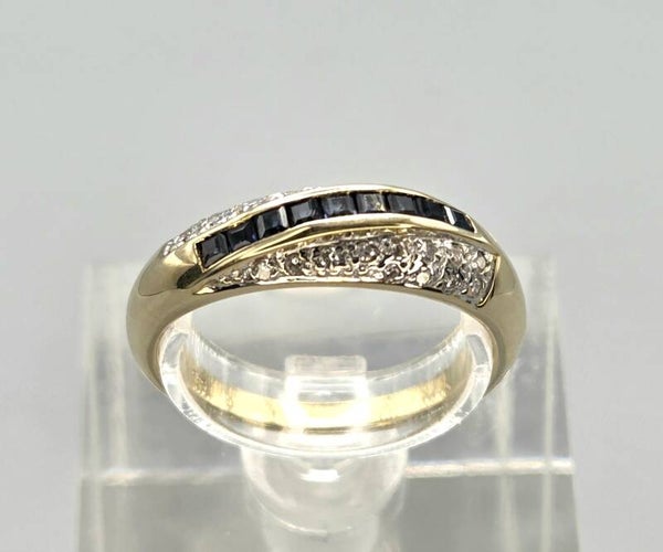 Vintage ring met saffier en ca. 0.24 ct diamanten. 2026/693