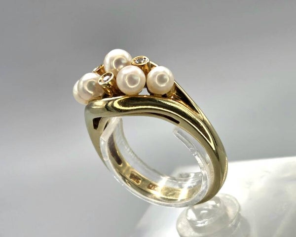 Vintage ring met parel en diamanten. 2026/695