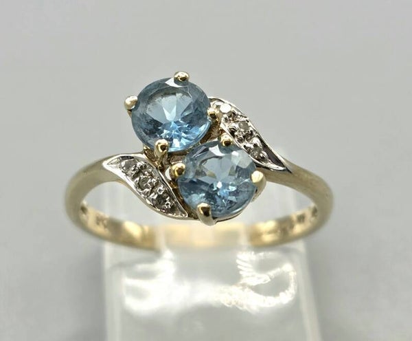 Vintage ring met topaas en diamanten. 2026/751. Mt: 16.75