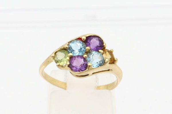 Gouden vintage ring met peridot,amethist,citrien en topaas . Maat:16.8. 2021/229.