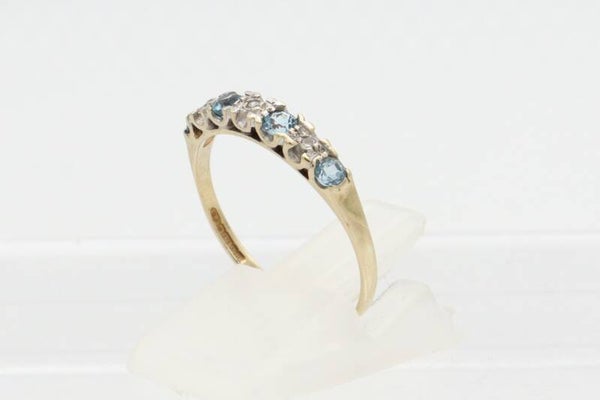 Vintage ring met topaas en diamant. Maat:17.5. Nr: 2021/297
