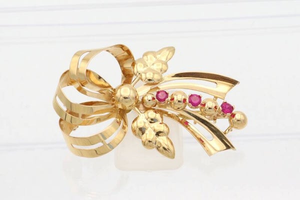 Gouden antieke broche met robijnen. 2021/312