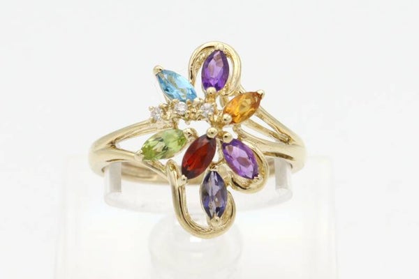 Vintage ring met amethist, citrien, peridot, topaas, granaat en tanzaniet. Maat: 18.75. 2021/330.