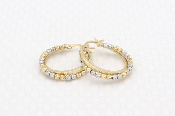 Gouden bi-collor gediamanteerde oorbellen. 2020/155.