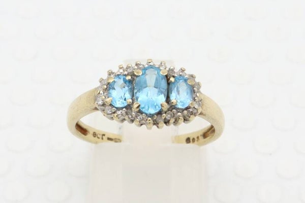 Vintage ring met topaas en diamanten. Maat: 17.75. Nr: 2021/391