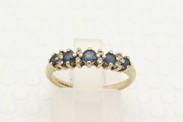 Vintage aanschuifring  met saffier en diamanten. 2021/403.