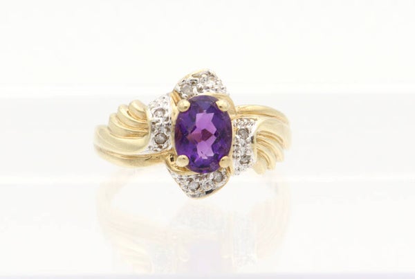 Vintage ring met amethist en diamanten. Maat: 18.6. 2021/436.
