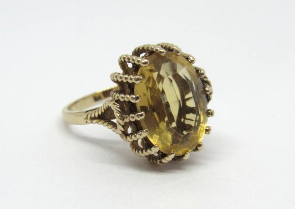 9 Karaat. Antieke ring met citrien. Maat: 17.25. Nr: 19/A259.