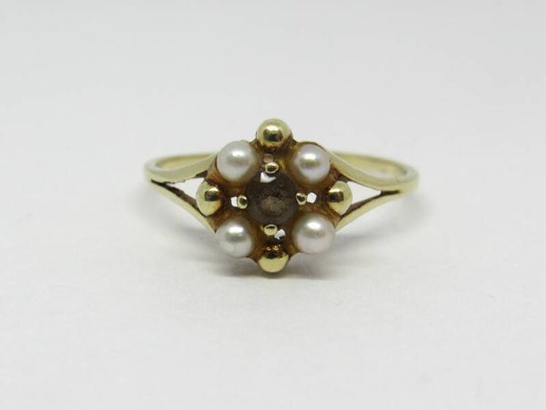 14 Karaat. Ring met parel en citrien. Maat: 17.8. Nr: 19/A271.