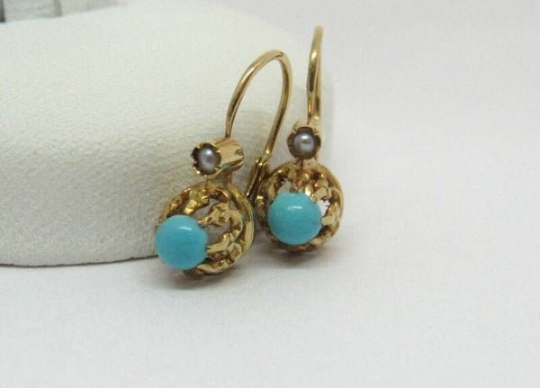 18 Karaat. Antieke gouden oorbellen met turkooise en zaadparel. Nr: 19/A 292.
