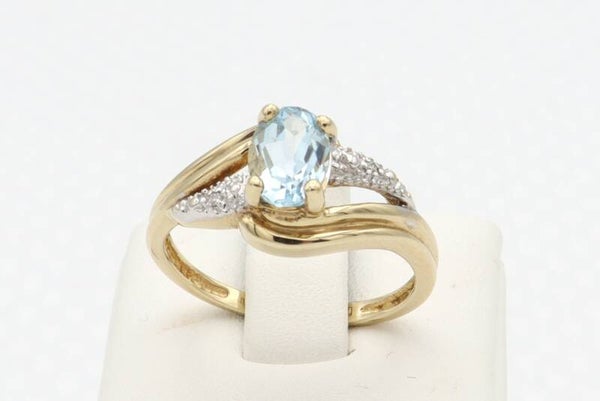9 Karaat. Vintage ring met aquamarijn en diamant. Maat 16.3. Nr: 2020/327.