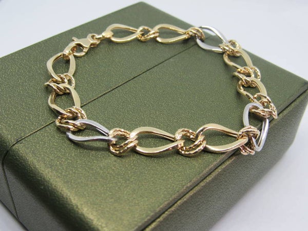 14 Karaat. Gouden armband vintage stijl in wit en geel goud. Nr: 19/A446.