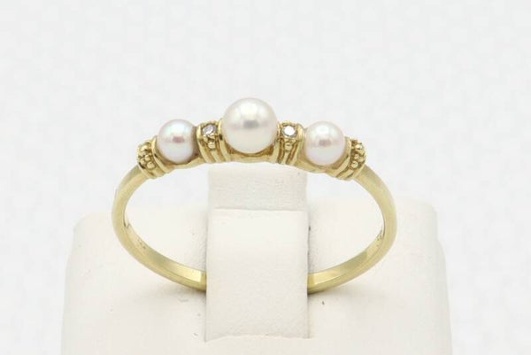 14 Karaat. Gouden vintage ring met parel en diamant. Maat:17.1. Nr: 2020/597.