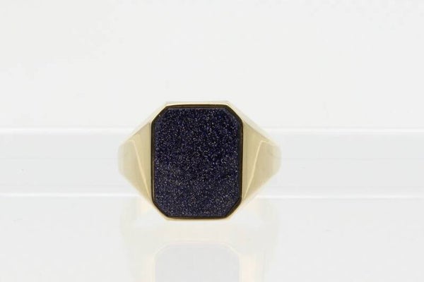 Gouden ring met blauwe goudsteen. Maat: 20.7. 2020/640.