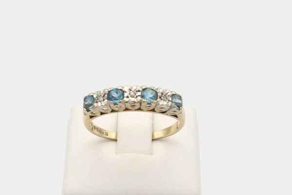 Vintage ring met topaas en diamant. Maat:17.2. 2020/674.