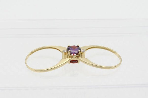 Gouden vintage vouw ring met amethist en rode saffier. Maat: 18.3. 2020/835.