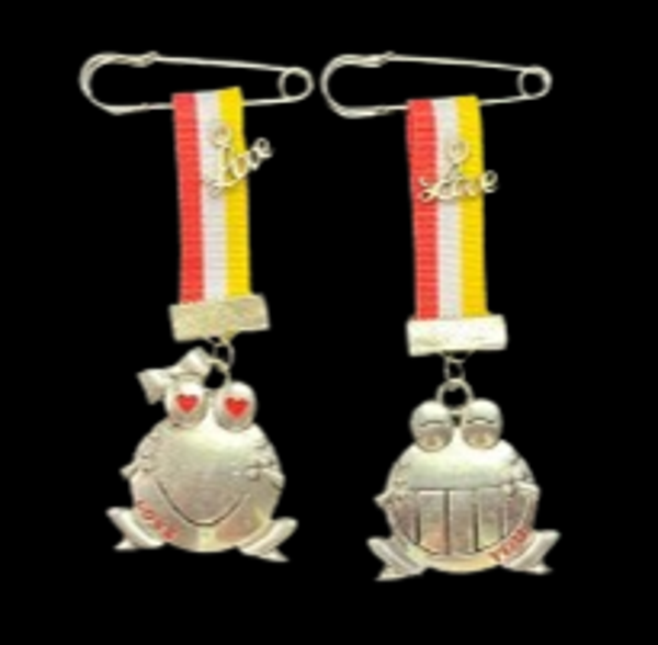 His&Hers broche Oeteldonk