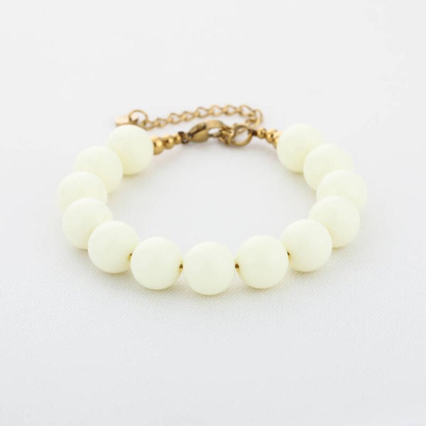 # 85 kralen armband geel/wit