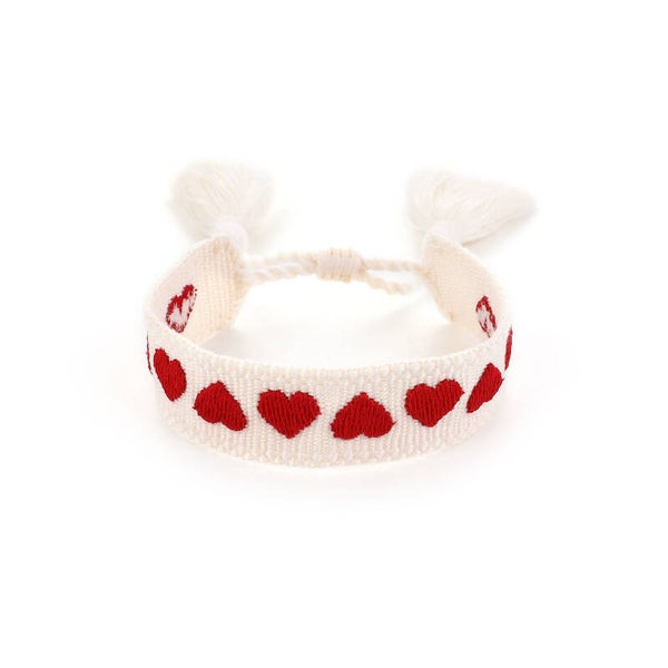 # 64 beige/rood hartjes armband