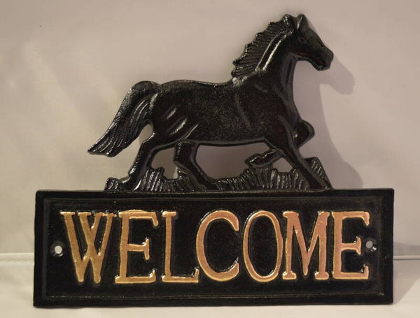 Welcome , met paard gietijzeren deurbord.