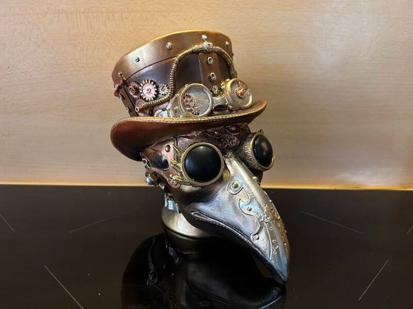 Kraaikop steampunk beeld goudkleurig