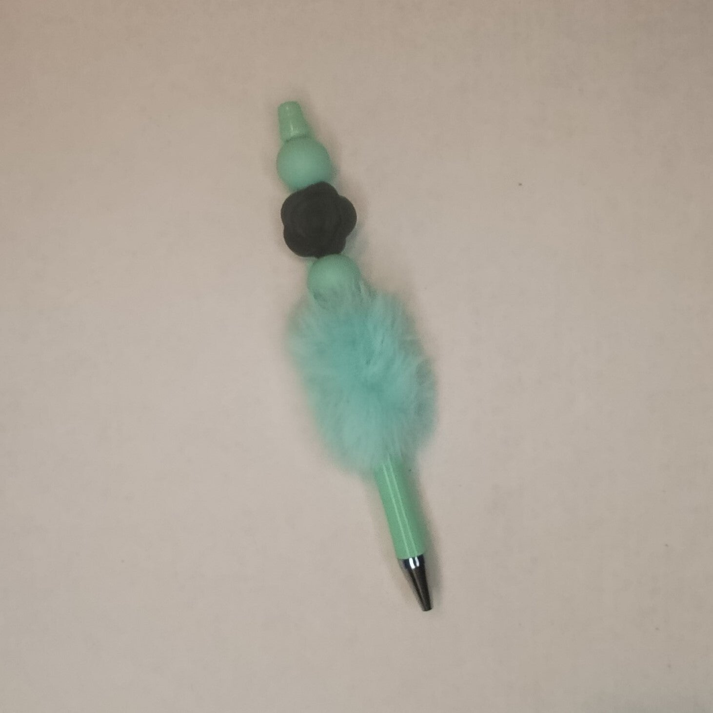 Pen, Pluch , mint met zwart Roos