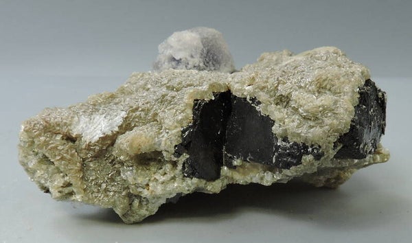 Ferberite, muscovite, fluorite and siderite from Portugal – miniature