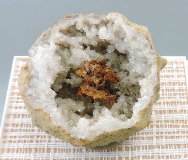 Ankerite pseudomorph after dolomite in quartz geode from Indiana, USA – small miniature