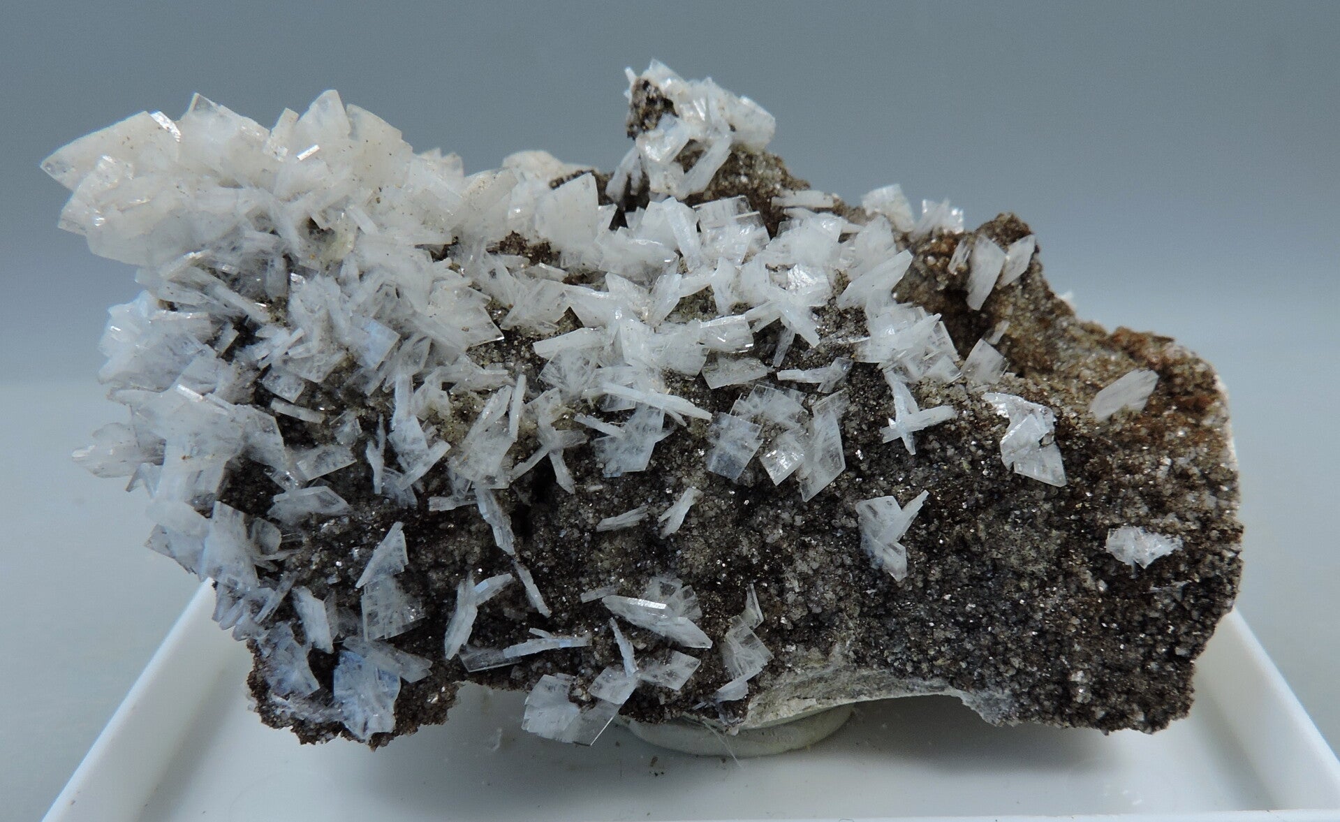 White baryte on matrix from Spain – miniature