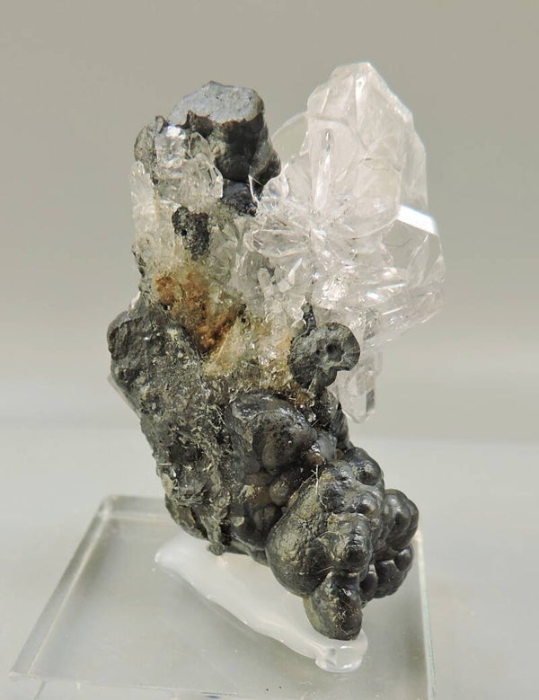 Baryte on psilomelane from Germany – small miniature