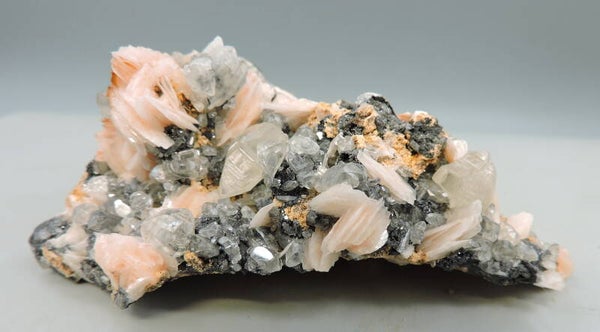 Fluorescent cerussite, pink baryte and galena from Morocco – cabinet size