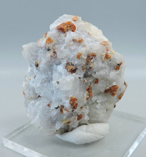 Clinohumite and spinel on matrix from Namibia – thumbnail